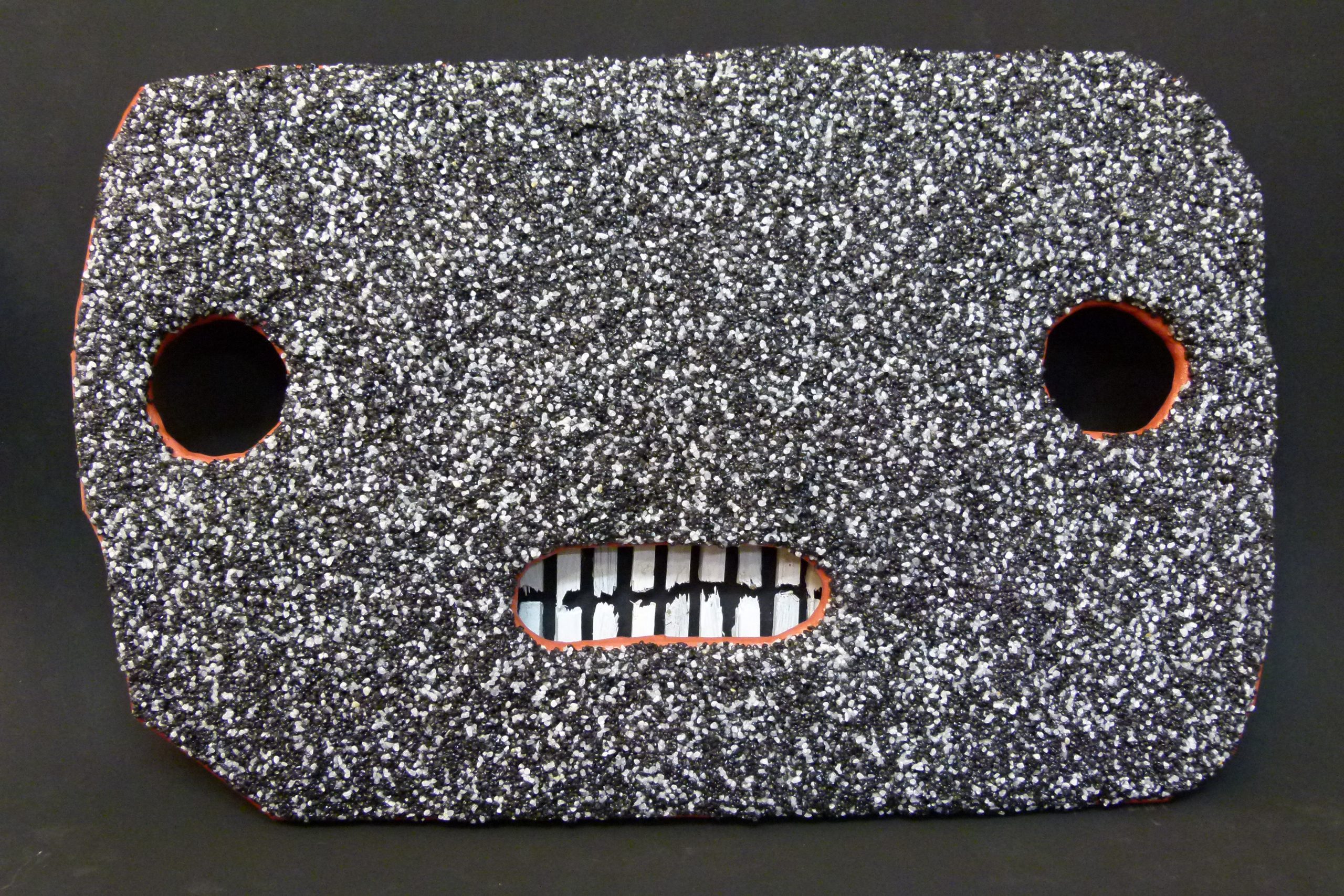 Die Maske der Dummheit und Verblendung